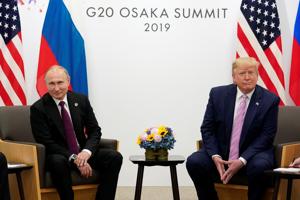 Donald Trump lightheartedly asked Russian President Vladimir Putin not to interfere in the upcoming US election during a meeting at the G20 summit.(REUTERS) Donald Trump lightheartedly asked Russian President Vladimir Putin not to interfere in the upcoming US election during a meeting at the G20 summit.(REUTERS)