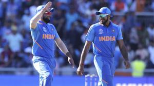 Mohammed Shami, left, mimics West Indies' Sheldon Cottrell after his dismissal.(AP) Mohammed Shami, left, mimics West Indies' Sheldon Cottrell after his dismissal.(AP)