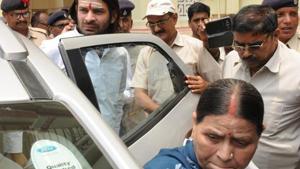 RJD leaders Rabari Devi and her son Tejpratap Yadav walk out at the Assembly in protest against the children death due to AES on the first day of Budget Session in Patna.(A P Dube /Hindustan Times) RJD leaders Rabari Devi and her son Tejpratap Yadav walk out at the Assembly in protest against the children death due to AES on the first day of Budget Session in Patna.(A P Dube /Hindustan Times)