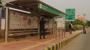 The RWA members agreed to install a banner at the main gate, informing residents of the expansion of the bus service.(Parveen Kumar / Hindustan Times) The RWA members agreed to install a banner at the main gate, informing residents of the expansion of the bus service.(Parveen Kumar / Hindustan Times)