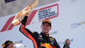 Red Bull's Max Verstappen celebrates after winning the race on the podium.(REUTERS) Red Bull's Max Verstappen celebrates after winning the race on the podium.(REUTERS)