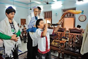 A Jewish blows the 'shofar' horn to gather devotees around the Torah at the Magen Abraham Synagogue in Ahmedabad on September 9, 2010, on Jewish New Year, Rosh Hashana.(AFP) A Jewish blows the 'shofar' horn to gather devotees around the Torah at the Magen Abraham Synagogue in Ahmedabad on September 9, 2010, on Jewish New Year, Rosh Hashana.(AFP)