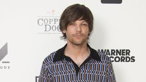 Singer Louis Tomlinson poses for photographers upon arrival at the screening for As it Was.(Joel C Ryan/Invision/AP) Singer Louis Tomlinson poses for photographers upon arrival at the screening for As it Was.(Joel C Ryan/Invision/AP)