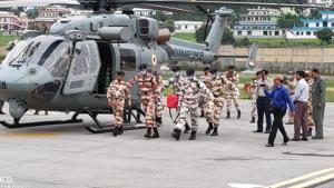 ITBP personnel carry the bodies of climbers at Naini Saini airport in Pithoragarh where they were brought down on Wednesday morning by IAF choppers. ITBP personnel carry the bodies of climbers at Naini Saini airport in Pithoragarh where they were brought down on Wednesday morning by IAF choppers.