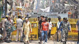 Residents and defence personnel seen near closed shops after clashes broke out over a parking issue, at Lal Kuan Bazar, Hauz Qazi, in New Delhi, India.(Sanjeev Verma/ Hindustan Times) Residents and defence personnel seen near closed shops after clashes broke out over a parking issue, at Lal Kuan Bazar, Hauz Qazi, in New Delhi, India.(Sanjeev Verma/ Hindustan Times)