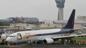 A SpiceJet Boeing 737-800 airplane is seen after it overshot the runway while landing due to heavy rains at an airport in Mumbai, India July 2, 2019.(REUTERS) A SpiceJet Boeing 737-800 airplane is seen after it overshot the runway while landing due to heavy rains at an airport in Mumbai, India July 2, 2019.(REUTERS)
