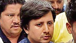In a video that went viral on June 26, Akash was seen hitting an Indore Municipal Corporation official leading a team to demolish the house of a BJP worker. (ANI photo) In a video that went viral on June 26, Akash was seen hitting an Indore Municipal Corporation official leading a team to demolish the house of a BJP worker. (ANI photo)