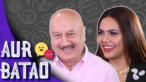 <p>In the latest episode of 'Aur Batao' with RJ Stutee, Bollywood veteran Anupam Kher reveals the one question he would like to ask Rahul and Sonia Gandhi - when will he get married? Stutee, and Kher's 'One Day: Justice Delivered' co-star Esha Gupta, also try to poke fun at him over his baldness, but the actor turns the tables with his comic timing. The duo also discuss their upcoming movie which will hit the screens on July 5. The story revolves around a judge who tries to bring criminals to justice from outside the system. Esha Gupta plays the role of a CBI officer. Aur Batao is not your regular photoshopped chat show but makes hanging out with celebs a whole new (and fun) ballgame.</p>