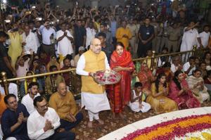 Union Home Minister Amit Shah, along with his wife Sonal Shah, performed the ‘Mangala Aarti’ on Thursday morning at the historic Jagannath Temple here, to kick-start the annual Gujarat Jagannath Rath Yatra that coincides with the Puri festival.(PTI) Union Home Minister Amit Shah, along with his wife Sonal Shah, performed the ‘Mangala Aarti’ on Thursday morning at the historic Jagannath Temple here, to kick-start the annual Gujarat Jagannath Rath Yatra that coincides with the Puri festival.(PTI)