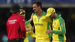 Australia's Mitchell Starc (C) celebrates with teammates after taking the wicket.(AFP) Australia's Mitchell Starc (C) celebrates with teammates after taking the wicket.(AFP)