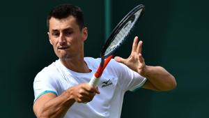 Australia's Bernard Tomic returns against France's Jo-Wilfried Tsonga.(AFP) Australia's Bernard Tomic returns against France's Jo-Wilfried Tsonga.(AFP)
