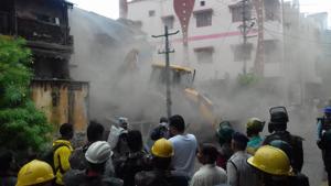 The building at the centre of the controversy involving local Bharatiya Janata Party (BJP) legislator Akash Vijayvargia was demolished by the civic body in Madhya Pradesh’s Indore city on Friday.(HT Photo) The building at the centre of the controversy involving local Bharatiya Janata Party (BJP) legislator Akash Vijayvargia was demolished by the civic body in Madhya Pradesh’s Indore city on Friday.(HT Photo)