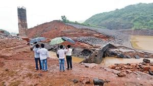 Officials of the irrigation department visit the breached Tiware dam near Chiplun in Ratnagiri, on Thursday. An SIT will now investigate if construction was faulty.(Pratham Gokhale/HT Photo) Officials of the irrigation department visit the breached Tiware dam near Chiplun in Ratnagiri, on Thursday. An SIT will now investigate if construction was faulty.(Pratham Gokhale/HT Photo)