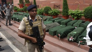 Security personnel check budget papers on Parliament House premises on Friday.(Raj K Raj/ HT photo) Security personnel check budget papers on Parliament House premises on Friday.(Raj K Raj/ HT photo)