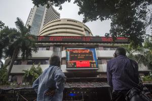 Men look up as they watch finance budget on the screen at Bombay Stock Exchange in Mumbai, India, on Friday, July 5, 2019.(Pratik Chorge/HT Photo) Men look up as they watch finance budget on the screen at Bombay Stock Exchange in Mumbai, India, on Friday, July 5, 2019.(Pratik Chorge/HT Photo)