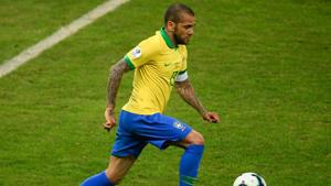 Brazil's Dani Alves drives the ball during the Copa America semi-final match against Argentina at the Mineirao Stadium in Belo Horizonte.(AFP) Brazil's Dani Alves drives the ball during the Copa America semi-final match against Argentina at the Mineirao Stadium in Belo Horizonte.(AFP)
