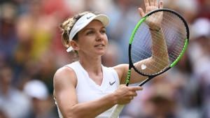 Romania's Simona Halep celebrates beating Belarus's Victoria Azarenka.(AFP) Romania's Simona Halep celebrates beating Belarus's Victoria Azarenka.(AFP)