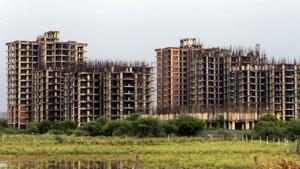 Apart from this new proposed deduction, the interest paid on housing loans was already allowed as a deduction to the extent of <span class='webrupee'>₹</span>2 lakh but for ‘self-occupied property’. Will the interest component go up to <span class='webrupee'>₹</span>3.5 lakh?(PTI File Photo) Apart from this new proposed deduction, the interest paid on housing loans was already allowed as a deduction to the extent of <span class='webrupee'>₹</span>2 lakh but for ‘self-occupied property’. Will the interest component go up to <span class='webrupee'>₹</span>3.5 lakh?(PTI File Photo)