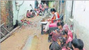 Students in basic education department schools here are forced to study in the open, even during the rainy season, due to lack of classrooms in rented buildings or because there is no building at all.(HT Photo) Students in basic education department schools here are forced to study in the open, even during the rainy season, due to lack of classrooms in rented buildings or because there is no building at all.(HT Photo)