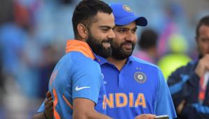 India's Rohit Sharma (R) is interviewed by India's captain Virat Kohli (L) on the pitch.(AFP) India's Rohit Sharma (R) is interviewed by India's captain Virat Kohli (L) on the pitch.(AFP)