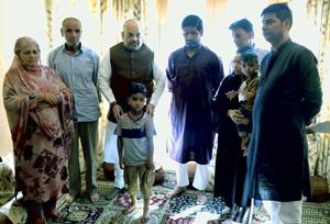Union home minister Amit Shah meeting the family members of police officer Arshad Khan, who was killed in an encounter in Anantnag in June. His real test will be in the inclusiveness of the participation in the forthcoming assembly elections(ANI) Union home minister Amit Shah meeting the family members of police officer Arshad Khan, who was killed in an encounter in Anantnag in June. His real test will be in the inclusiveness of the participation in the forthcoming assembly elections(ANI)