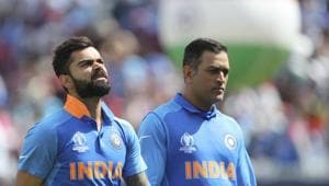Indian captain Virat Kohli with MS Dhoni standing for national anthem at the Cricket World Cup in London.(AP) Indian captain Virat Kohli with MS Dhoni standing for national anthem at the Cricket World Cup in London.(AP)