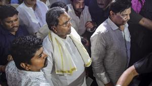 Former Karnataka chief minister Siddaramaiah leaves the chamber of Minister KJ George, where Congress leaders kept the rebel MLA K Sudhakar, in Bengaluru, Wednesday, July 10, 2019.(PTI photo) Former Karnataka chief minister Siddaramaiah leaves the chamber of Minister KJ George, where Congress leaders kept the rebel MLA K Sudhakar, in Bengaluru, Wednesday, July 10, 2019.(PTI photo)