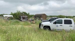 This May 20, 2019 photo provided by the Johnson County Sheriff's Office shows a medical examiners truck on the property of Freddie Mack's home in Venus, Texas. Authorities said Tuesday, July 9 thatthe 57-year-old Mack, who had been missing for months, was eaten, bones and all, by his dogs. Johnson County Sheriff Adam King says Mack had serious health problems and it's unclear whether his 18 dogs killed him or consumed his body after he died from a medical condition. A relative reported Mack missing in May.(AP) This May 20, 2019 photo provided by the Johnson County Sheriff's Office shows a medical examiners truck on the property of Freddie Mack's home in Venus, Texas. Authorities said Tuesday, July 9 thatthe 57-year-old Mack, who had been missing for months, was eaten, bones and all, by his dogs. Johnson County Sheriff Adam King says Mack had serious health problems and it's unclear whether his 18 dogs killed him or consumed his body after he died from a medical condition. A relative reported Mack missing in May.(AP)