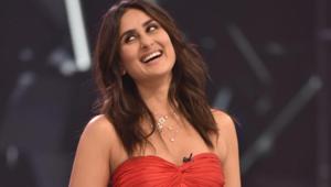 Kareena Kapoor Khan stuns in a red ensemble on a TV show set. Kareena Kapoor Khan stuns in a red ensemble on a TV show set.