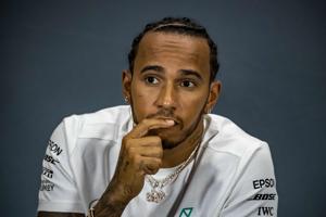 Mercedes' British driver Lewis Hamilton expresses disappointment in FIA hosting British GP on same day as Wimbledon and Cricket World Cup finals.(AFP) Mercedes' British driver Lewis Hamilton expresses disappointment in FIA hosting British GP on same day as Wimbledon and Cricket World Cup finals.(AFP)