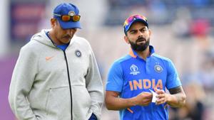 India's captain Virat Kohli (R) speaks with India's head coach Ravi Shastri. The due is set to have a meeting with CoA after World Cup 2019(AFP) India's captain Virat Kohli (R) speaks with India's head coach Ravi Shastri. The due is set to have a meeting with CoA after World Cup 2019(AFP)