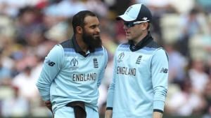 Adil Rashid listens to captain Eoin Morgan during the Cricket World Cup semi-final match between England and Australia at Edgbaston.(AP) Adil Rashid listens to captain Eoin Morgan during the Cricket World Cup semi-final match between England and Australia at Edgbaston.(AP)