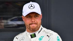 Mercedes' Finnish driver Valtteri Bottas looks on after securing pole position.(AFP) Mercedes' Finnish driver Valtteri Bottas looks on after securing pole position.(AFP)
