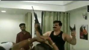 Three arms licenses of Uttarakhand MLA Kunwar Pranav Singh Champion, seen dancing with two pistols and a carbine in a viral video, have been suspended.(ANI/Twitter) Three arms licenses of Uttarakhand MLA Kunwar Pranav Singh Champion, seen dancing with two pistols and a carbine in a viral video, have been suspended.(ANI/Twitter)
