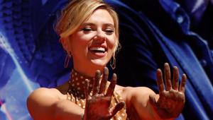 Actor Scarlett Johansson shows her hands after placing them in cement at a ceremony at the TCL Chinese Theatre in Hollywood.(REUTERS)