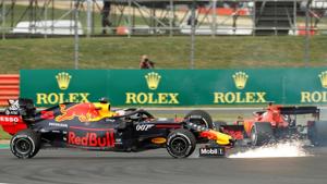 Red Bull's Max Verstappen and Ferrari's Sebastian Vettel crash during the race.(REUTERS) Red Bull's Max Verstappen and Ferrari's Sebastian Vettel crash during the race.(REUTERS)