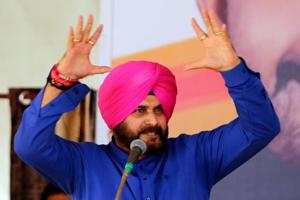 Navjot Sidhu hadn’t taken charge of the power ministry that he was allocated by Amarinder Singh in a reshuffle last month.(Sanjeev Kumar/ HT photo) Navjot Sidhu hadn’t taken charge of the power ministry that he was allocated by Amarinder Singh in a reshuffle last month.(Sanjeev Kumar/ HT photo)