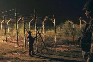 Border Security Force (BSF) soldiers standing guard during a night patrol near the fence at the India-Pakistan International Border at the outpost of Akhnoor sector.(HT Photo/ File) Border Security Force (BSF) soldiers standing guard during a night patrol near the fence at the India-Pakistan International Border at the outpost of Akhnoor sector.(HT Photo/ File)