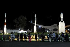 People standing next to models of Indian Space Research Organization (ISRO)'s Geosynchronous Satellite launch Vehicle (GSLV) MkII at Satish Dhawan Space Center after the Chandrayaan-2 mission was aborted from Sriharikota on Sunday.(ANI Photo) People standing next to models of Indian Space Research Organization (ISRO)'s Geosynchronous Satellite launch Vehicle (GSLV) MkII at Satish Dhawan Space Center after the Chandrayaan-2 mission was aborted from Sriharikota on Sunday.(ANI Photo)