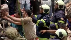 Mumbai building collapse: Hundreds of fire brigade, Mumbai Police, National Disaster Response Force (NDRF) and civic body officials rushed to the site as congested lanes made it difficult to access the area.(ANI Twitter Image) Mumbai building collapse: Hundreds of fire brigade, Mumbai Police, National Disaster Response Force (NDRF) and civic body officials rushed to the site as congested lanes made it difficult to access the area.(ANI Twitter Image)