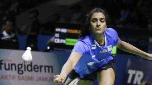 Sindhu Pusarla of India returns a shot to Nozomi Okuhara of Japan.(AP) Sindhu Pusarla of India returns a shot to Nozomi Okuhara of Japan.(AP)
