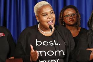 In this May 7, 2019 file photo Rep. Erica Thomas, D-Austell, speaks during a news conference in Atlanta. Thomas says she was verbally attacked in a supermarket by a white man who told her, In this May 7, 2019 file photo Rep. Erica Thomas, D-Austell, speaks during a news conference in Atlanta. Thomas says she was verbally attacked in a supermarket by a white man who told her,