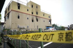 A police officer stands in front of the Kyoto Animation Studio building consumed in an arson attack Saturday on July 20, 2019 in Kyoto, Japan. The man suspected of setting ablaze a beloved Japanese animation studio was raging about theft and witnesses and media reported he had a grudge against the company, as questions arose why such mass killings keep happening in the country.(Photo: AP) A police officer stands in front of the Kyoto Animation Studio building consumed in an arson attack Saturday on July 20, 2019 in Kyoto, Japan. The man suspected of setting ablaze a beloved Japanese animation studio was raging about theft and witnesses and media reported he had a grudge against the company, as questions arose why such mass killings keep happening in the country.(Photo: AP)