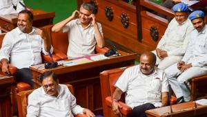 Karnataka Chief Minister HD Kumaraswamy, his deputy G Parameshwara and cabinet colleagues gesture during Assembly Session at Vidhana Soudha, in Bengaluru on Friday.(PTI) Karnataka Chief Minister HD Kumaraswamy, his deputy G Parameshwara and cabinet colleagues gesture during Assembly Session at Vidhana Soudha, in Bengaluru on Friday.(PTI)