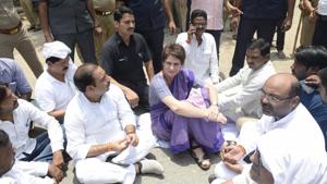 Congress General Secretary Priyanka Gandhi Vadra sits in protest on the roadside, after she was stopped from proceeding to Sonbhadra to meet victims of clash that claimed 10 lives, in Mirzapur.(PTI Photo) Congress General Secretary Priyanka Gandhi Vadra sits in protest on the roadside, after she was stopped from proceeding to Sonbhadra to meet victims of clash that claimed 10 lives, in Mirzapur.(PTI Photo)