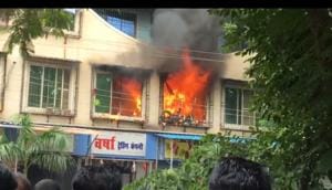 The seven-storey building, Mahakavi Kailas Heights, at Katrap caught fire on Saturday The seven-storey building, Mahakavi Kailas Heights, at Katrap caught fire on Saturday