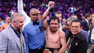 Manny Pacquiao (white trunks) celebrates after defeating Keith Thurman.(USA TODAY Sports) Manny Pacquiao (white trunks) celebrates after defeating Keith Thurman.(USA TODAY Sports)