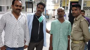 Rafiq (second from R, in green-coloured hospital gown) after being discharged at KGMU, Lucknow.(HT Photo) Rafiq (second from R, in green-coloured hospital gown) after being discharged at KGMU, Lucknow.(HT Photo)