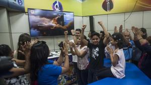 People watch and celebrate the successful launch of Chandrayaan 2 at Nehru Science Centre in Mumbai(Pratik Chorge/HT Photo) People watch and celebrate the successful launch of Chandrayaan 2 at Nehru Science Centre in Mumbai(Pratik Chorge/HT Photo)