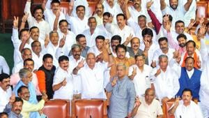 Former Chief Minister of Karnataka and BJP leader BS Yeddyurappa shows victory sign along with other members after the defeat of Congress-JD(S) coalition government at Vidhana Soudha in Bengaluru on Tuesday. (ANI Photo) Former Chief Minister of Karnataka and BJP leader BS Yeddyurappa shows victory sign along with other members after the defeat of Congress-JD(S) coalition government at Vidhana Soudha in Bengaluru on Tuesday. (ANI Photo)